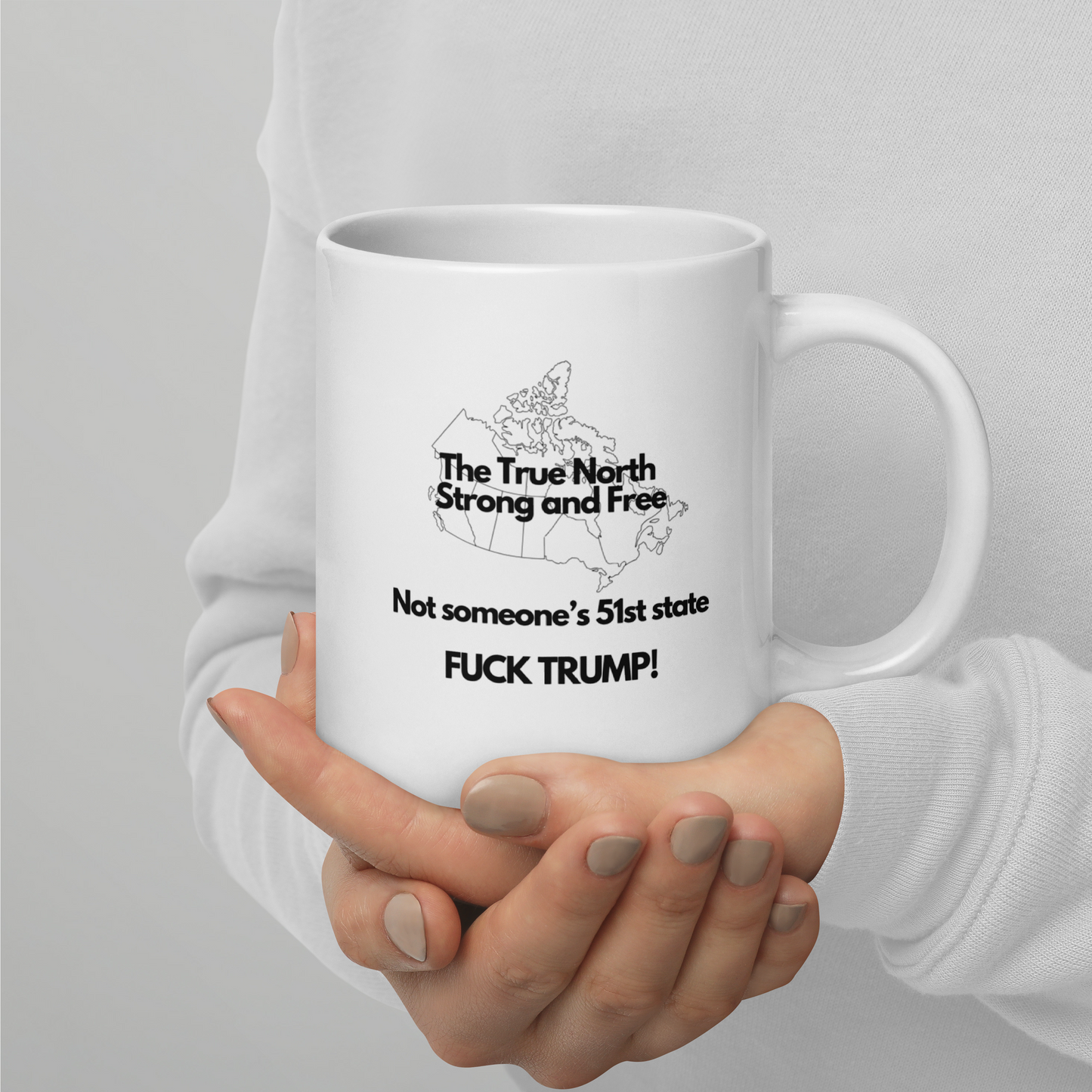 The True North Strong and Free Not someone's 51 State. Fuck Trump, White glossy mug