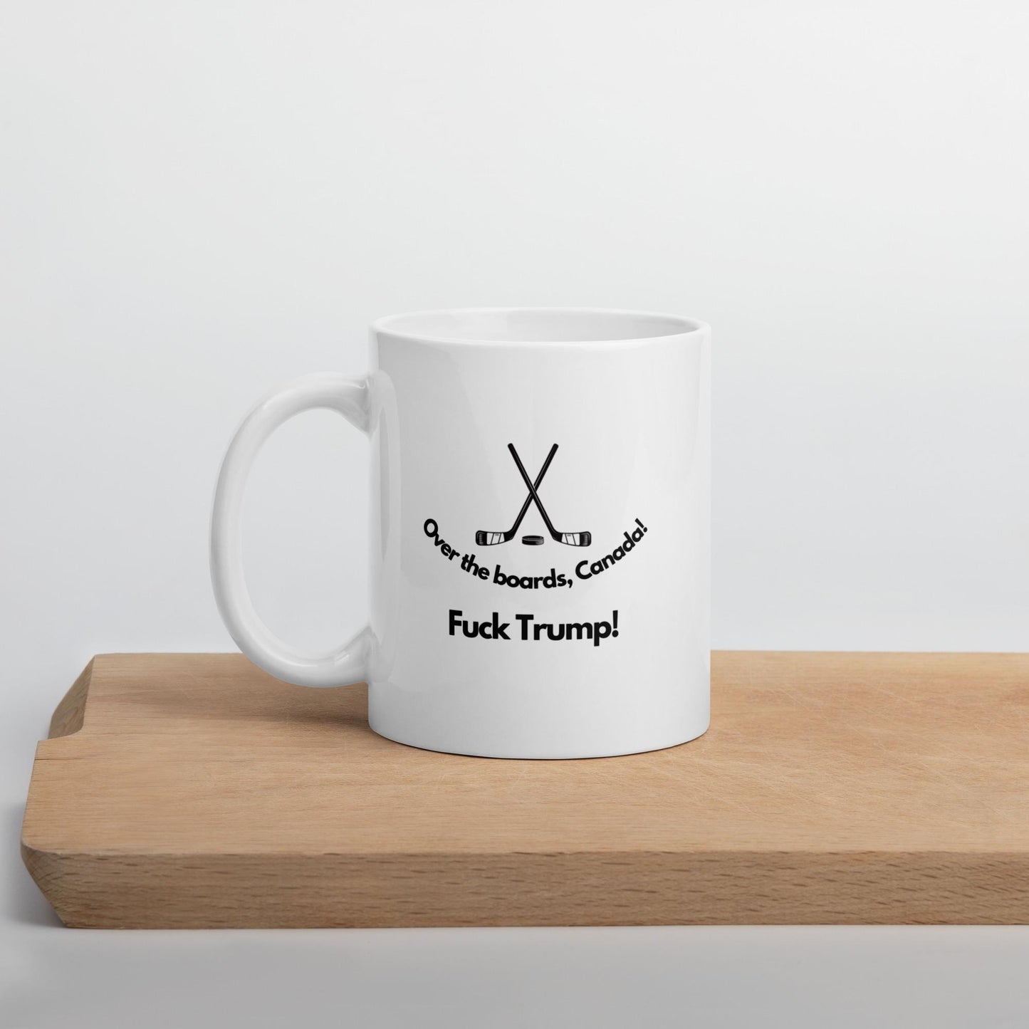 Over the Boards Canada. Fuck Trump. White glossy mug