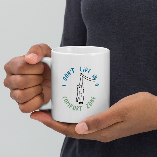 I don't live in a comfort zone. White glossy mug