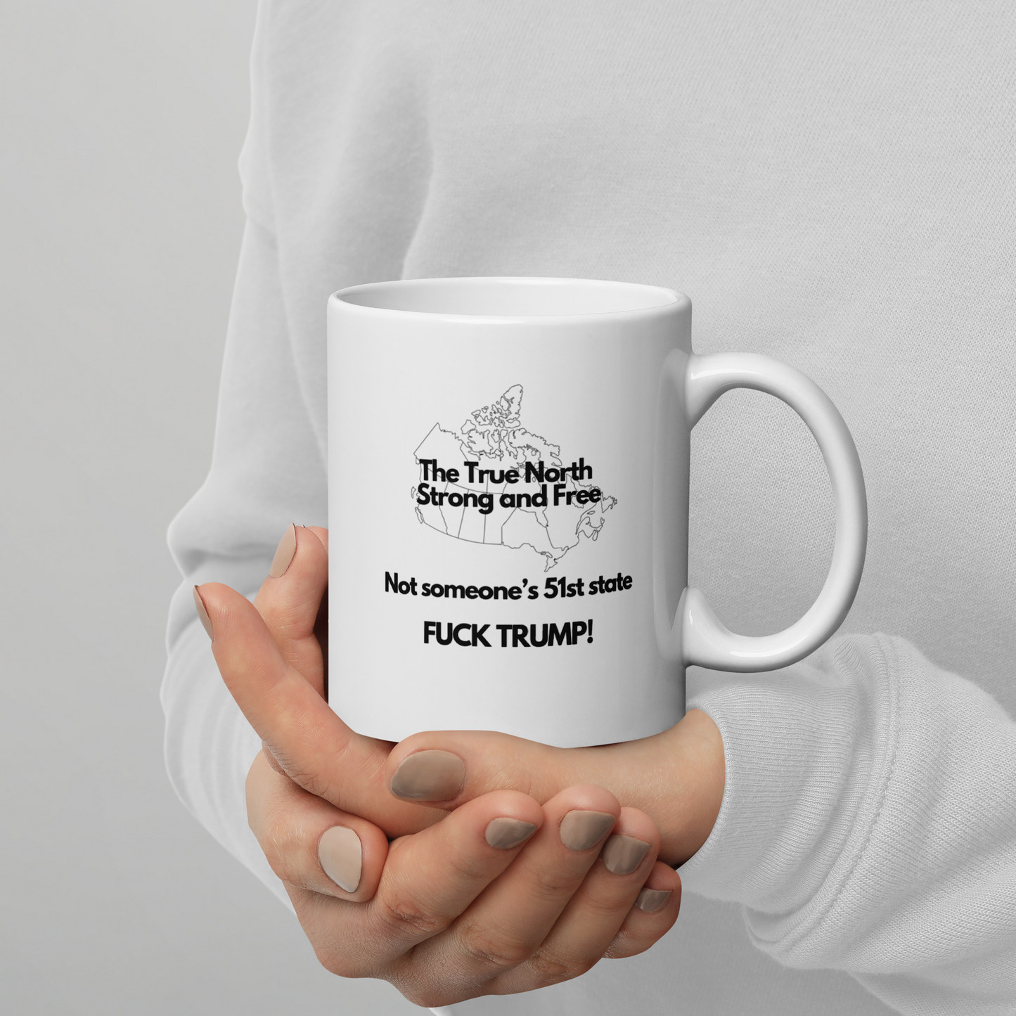 The True North Strong and Free Not someone's 51 State. Fuck Trump, White glossy mug