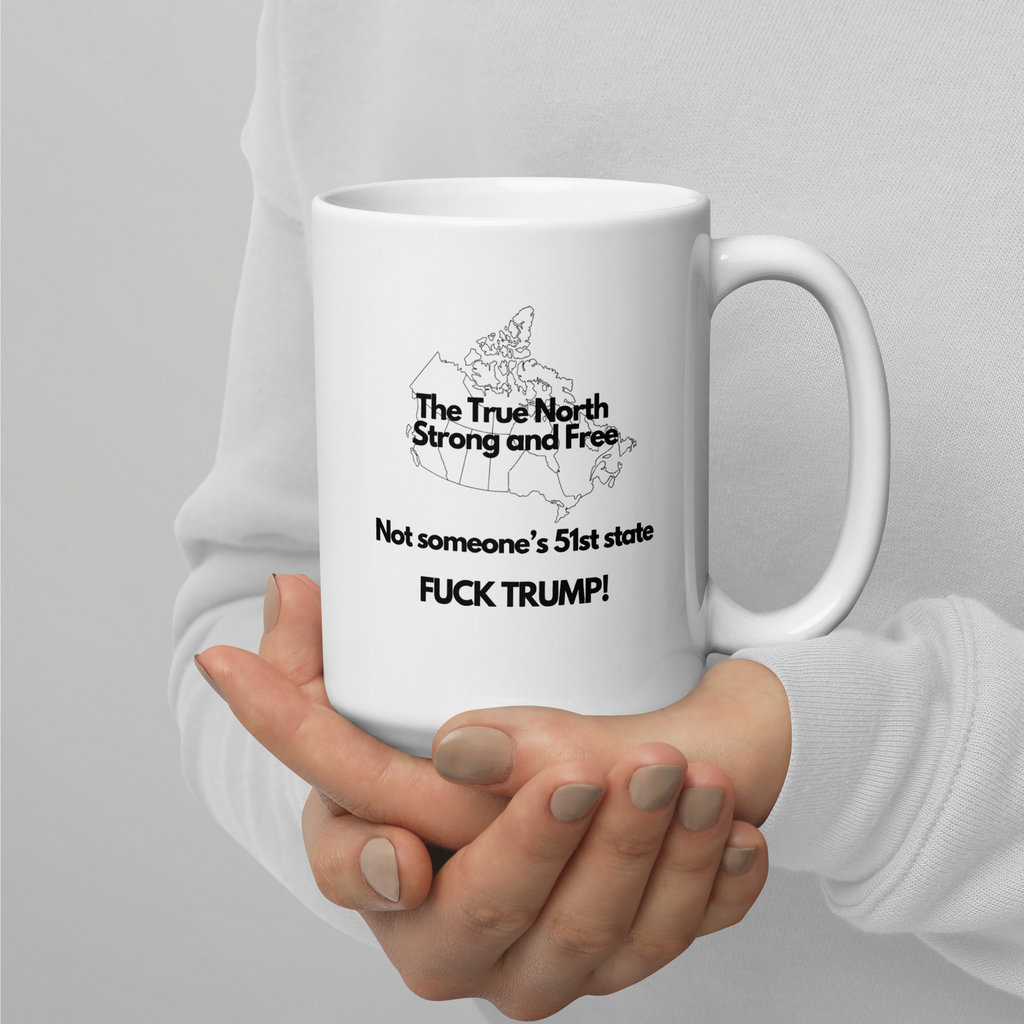 The True North Strong and Free Not someone's 51 State. Fuck Trump, White glossy mug